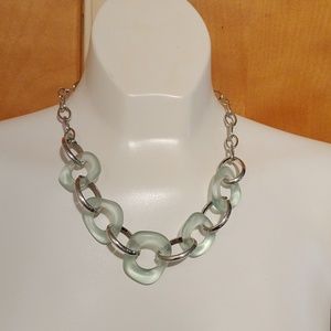 blue hoop necklace.
